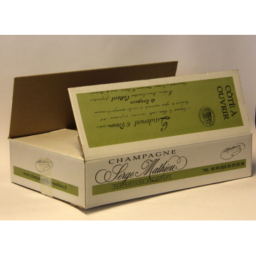 Caisse cartons pour 6 bouteilles de Champagne  standard avec calage de fond chevalet et plaque entre rabats par Smurfit Kappa CNC.
